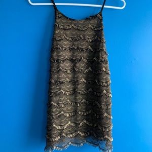 Black and gold holiday top